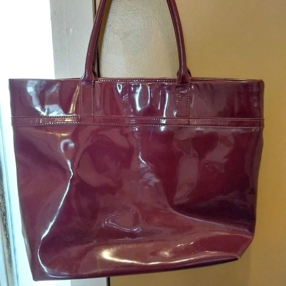 Purple, patent leather Kate Spade tote in great condition. - Picture 2 of 9